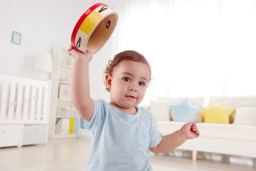 Hape Tap-along Tambourine, a first musical instruments for babies, perfect for making music The Toy Wagon