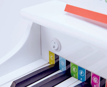 Hape Deluxe White Grand Piano a great first musical instrument for children The Toy Wagon