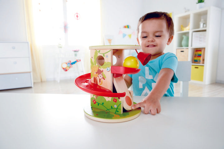 Hape Jungle Press and Slide first toys for toddlers encourage coordination, dexterity, imagination, and simple problem solving. The Toy Wagon