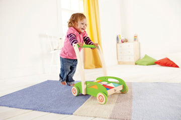 Hape Block and Roll wooden walker promotes dexterity, hand eye coordinations, and manipulations The Toy Wagon