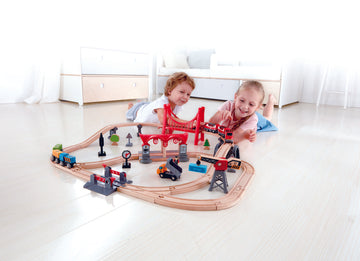 Hape Busy City Rail Set is wooden railway and train set The Toy Wagon