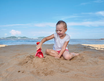 Hape Rain Shovel - Red perfect for the sand or backyard play with quality outdoor toys The Toy Wagon
