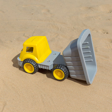 Hape Load & Tote Dump Truck perfect for the sand or backyard play with quality outdoor toys The Toy Wagon