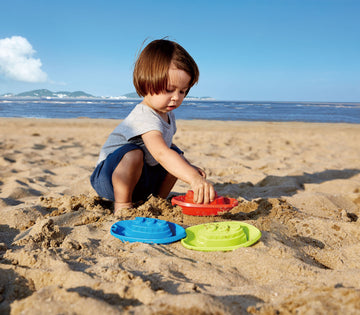 Hape Beach and Bath Boats perfect for the sand or backyard play with quality outdoor toys The Toy Wagon