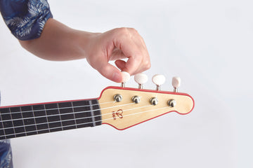 Hape Learn with Lights Ukulele-Red The Toy Wagon