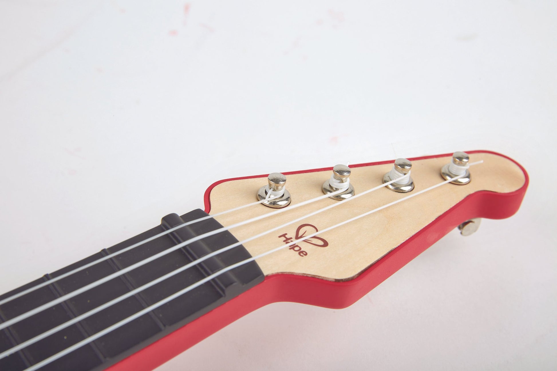 Hape Learn with Lights Ukulele-Red The Toy Wagon