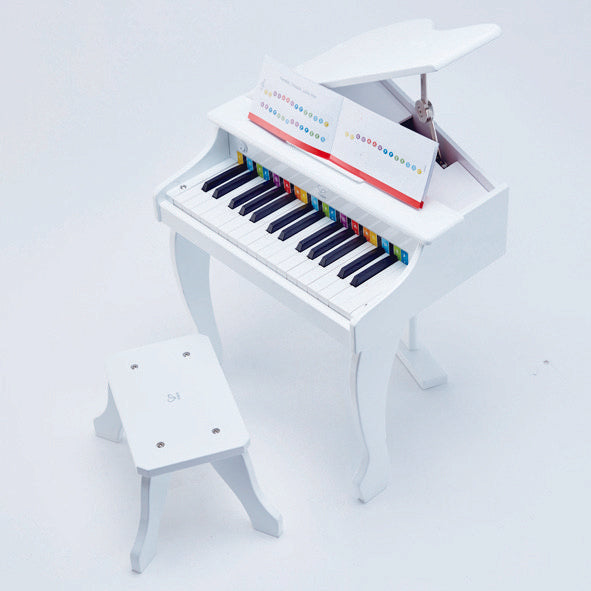 Hape Deluxe White Grand Piano a great first musical instrument for children The Toy Wagon