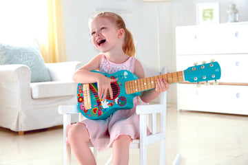 Hape Flower Power Guitar a great first musical instrument for children The Toy Wagon