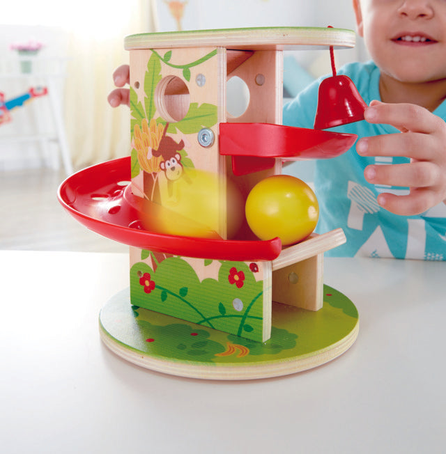 Hape Jungle Press and Slide first toys for toddlers encourage coordination, dexterity, imagination, and simple problem solving. The Toy Wagon