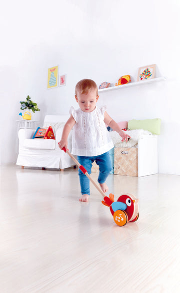 Hape Lilly Musical Push Along Pepe & Friends wooden push or pull along toy for babies The Toy Wagon
