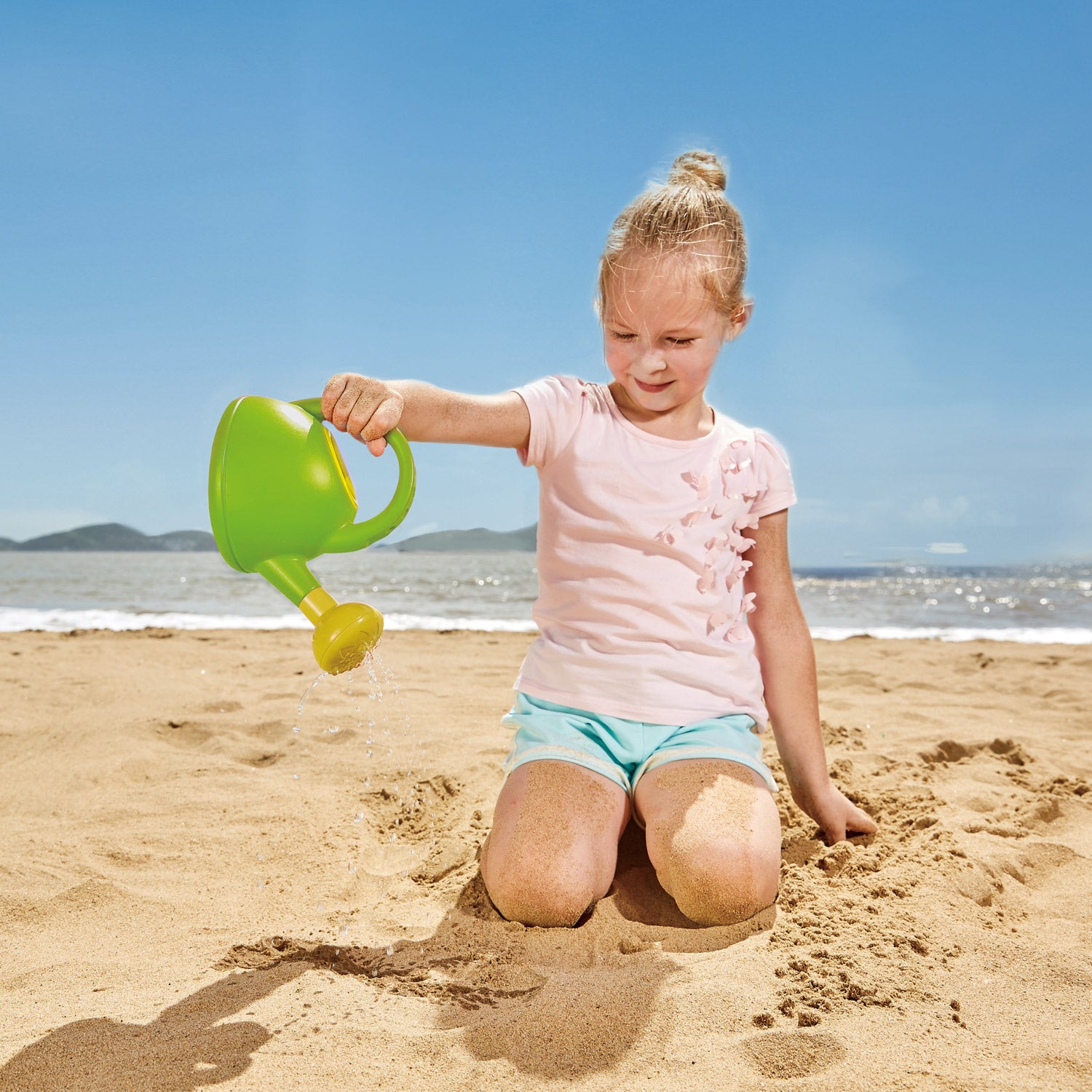 Hape Watering Can - Green perfect for the sand or backyard play with quality outdoor toys The Toy Wagon