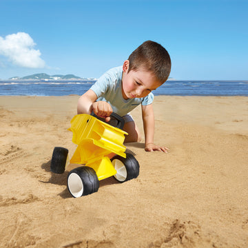 Hape Dump Truck - Yellow perfect for the sand or backyard play with quality outdoor toys The Toy Wagon