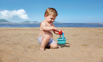 Hape Baby Bucket & Spade perfect for the sand or backyard play with quality outdoor toys The Toy Wagon