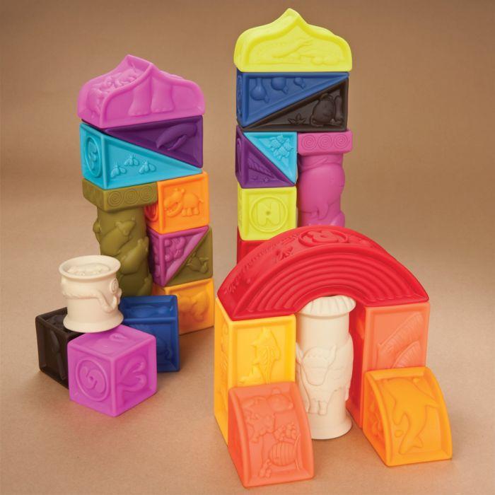 B.-elemenosqueeze A to Z architectural blocks with a different animal that are hand-sculpted for Nz babies.