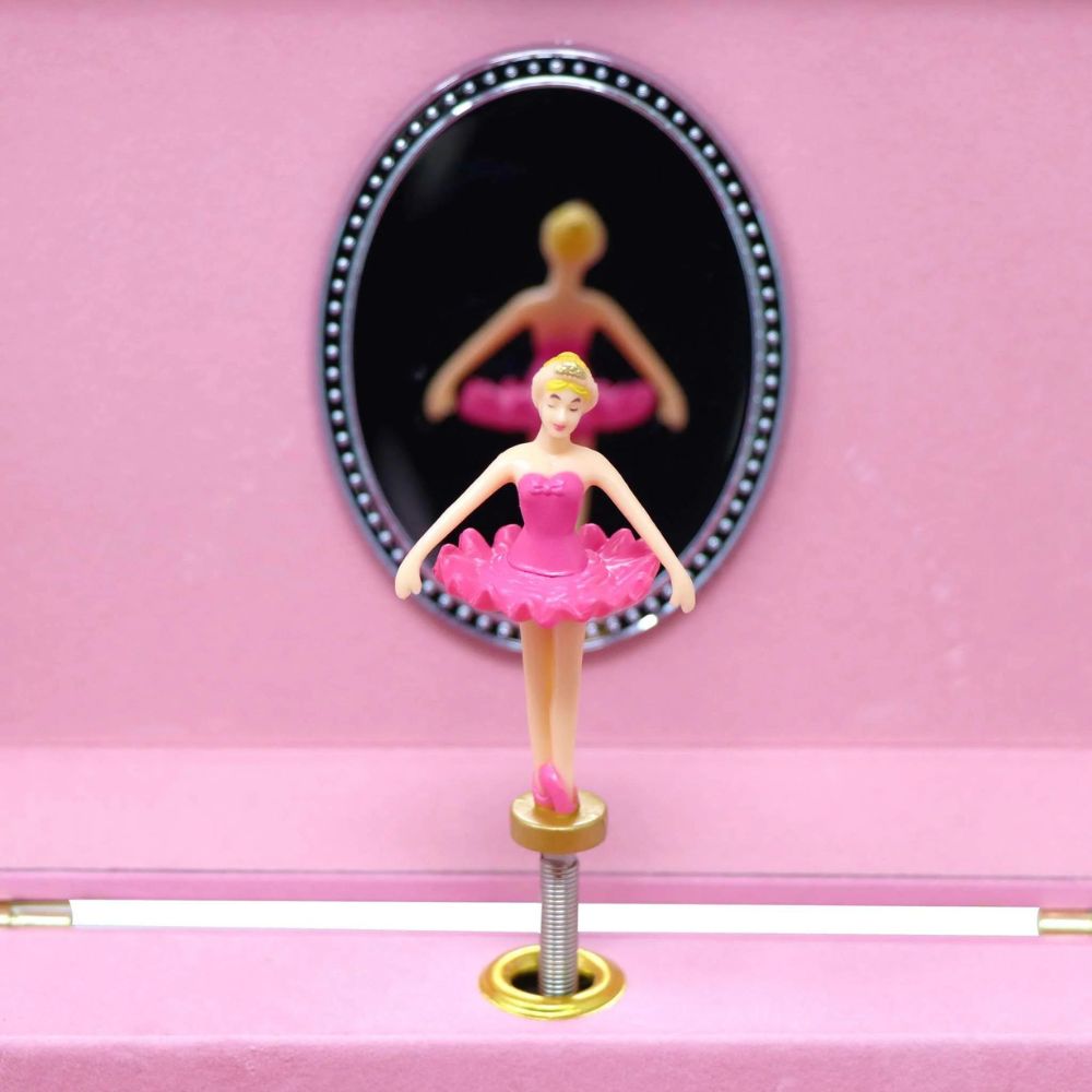 Musical jewellery box with dancing doll on store it